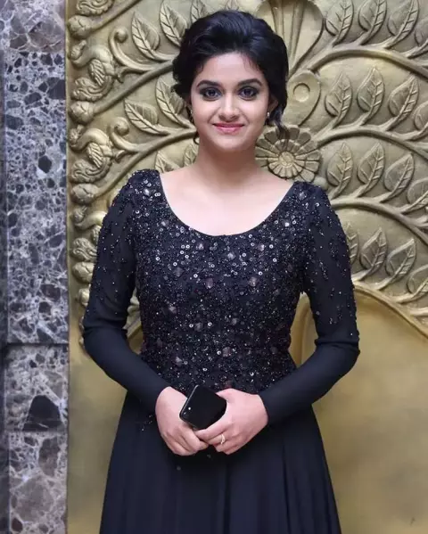 Actress in black dress